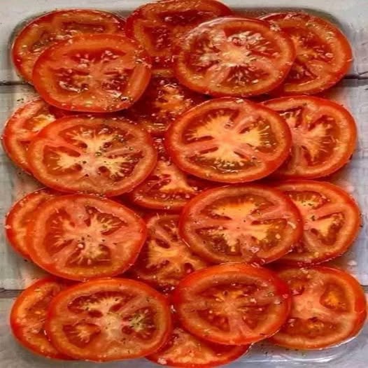 Rodajas de tomate condimentadas