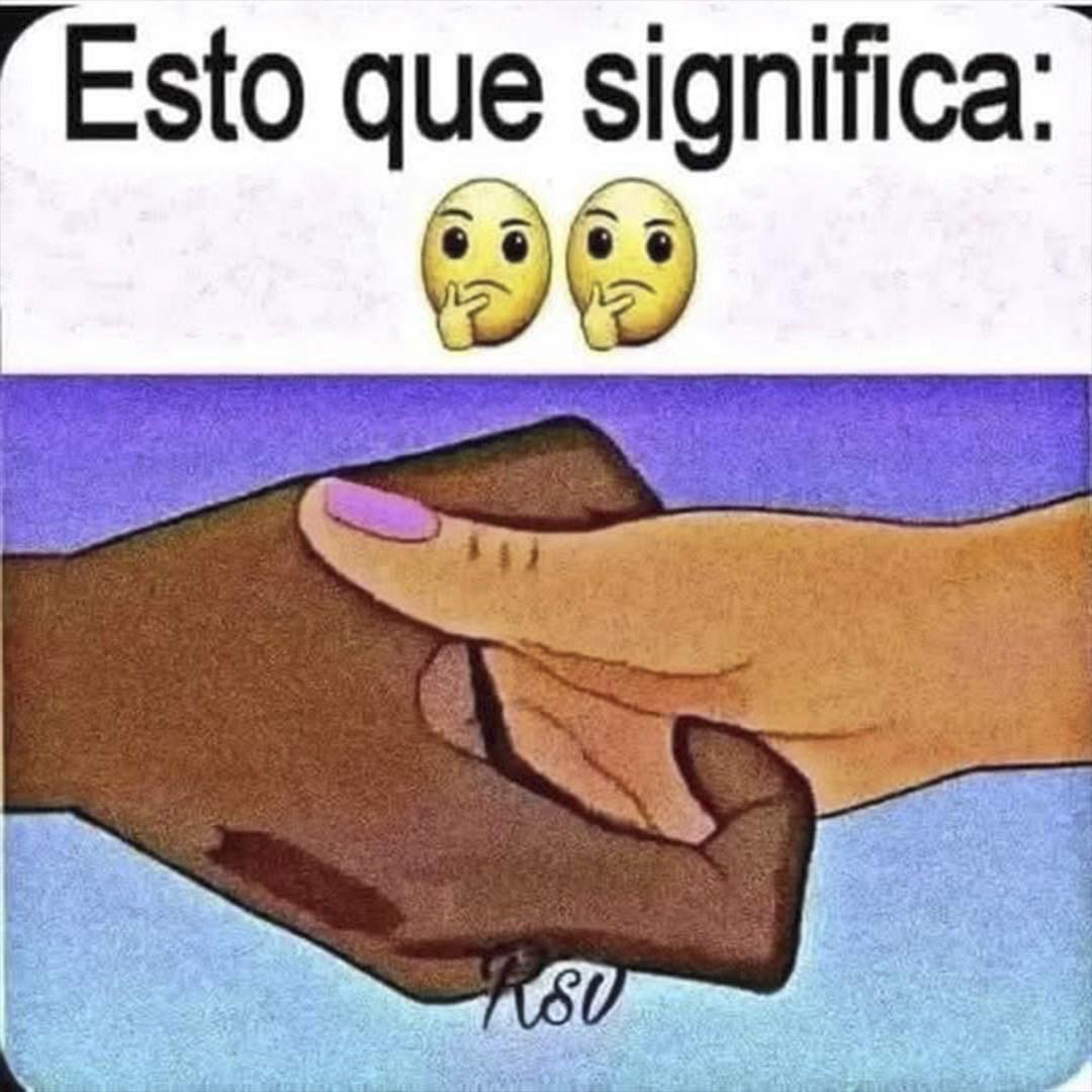 Dos manos de diferentes tonos de piel estrechándose